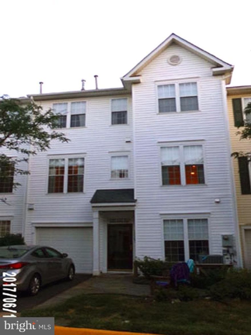 Absolutely luxurious! * Master bedroom is the entire top floor: with fireplace, luxury bath & walk-in closet with built in organizer* Gourmet kitchen with granite countertops & wood floors, 42" cabinets & recessed lighting * Garage * Extra storage room * Chair railing * 2 firepalces * 3' bump-out in living room & MBR * Separate laundry room *