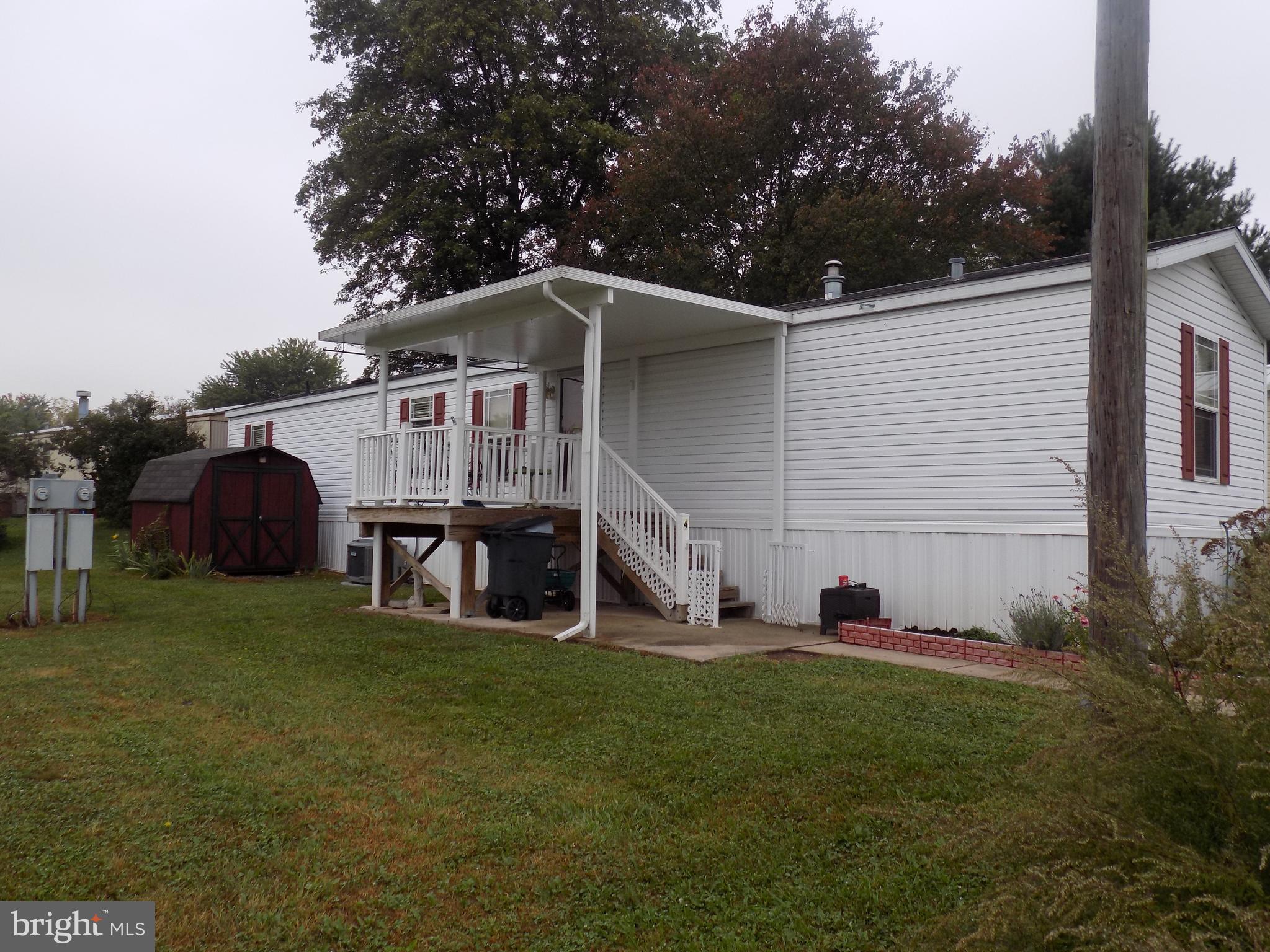 Come Check out this well cared for 2004 single wide mobile home located in Beach run Fredericksburg PA. Must be approved by park. Pets ok but limited and must be approved. Spacious covered front porch, small deck out the back door, nice shed, 3 bedroom 2 full bath. Fridge, oven , washer and dryer stay with home. Lot rent is only $326 a month and it covers trash and snow removal from the street. Furnace was just serviced!!