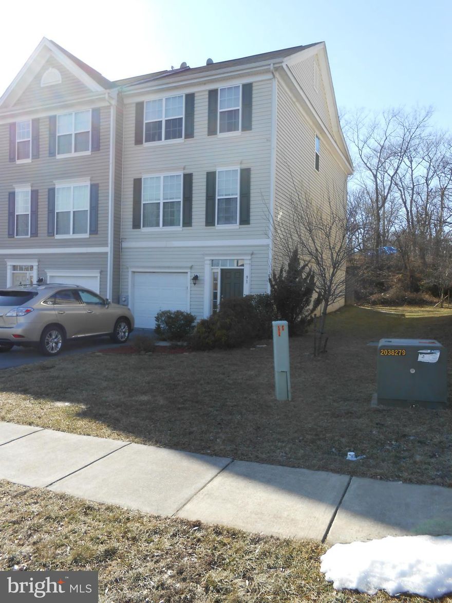 End Unit Townhome backs to trees. Features 3 Bedrooms, 2.5 baths with 1 Car Garage. Spacious living room/dining room. Kitchen has 42" cabinets, pantry and upgraded GE appliances. Bump out on all levels. Owner's suite has sitting room, luxury bath with soaking tub and separate shower. Finished family room in lower level. Close to commuter routes.