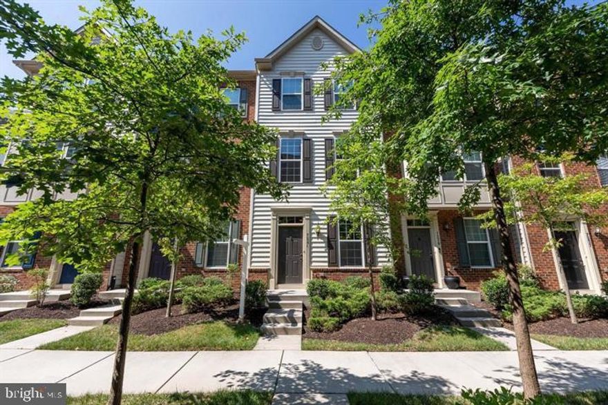 Located on a quiet street in Howard Square, this 3 bedroom, 3.5 bath townhome with garage shines like a fine diamond! An open floor plan, gleaming hardwood flooring, a gourmet kitchen, deck, and abundance of windows are just a few features that make this home so special. Rich hardwood floors greet you as you ascend the stairs and into the spacious living room with twin windows, rich hardwood floors and a soft neutral color palette. The open dining room and gourmet kitchen is a feast for the eyes with gleaming granite countertops, an abundance of 42" cabinetry and stainless steel appliances. A glass paned door opens to the deck, ideal for outdoor dining and relaxation. Upstairs, you'll find a light filled primary suite with en suite bath boasting a granite topped dual sink vanity and tub/shower with spa toned tile. A 2nd bright and cheerful bedroom has easy access to a well appointed hall bath with granite topped vanity, and a laundry closet with washer and dryer adds convenience. The 3rd bedroom on the entry level and an additional full bath adds versatile space to meet the demands of your lifestyle, while direct garage access to the oversized 1 car garage completes the comfort and luxury of this wonderful home! Close to shopping, dining, entertainment and commuters will love the easy access to major commuting routes!