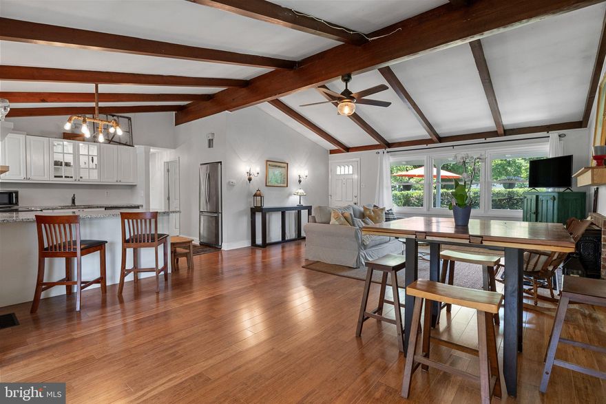 Welcome to 6315 Farmar Lane, a stunning mid-century modern ranch that perfectly balances vintage character with contemporary comfort in the heart of Flourtown. Situated on a serene 0.29-acre lot within the highly sought-after Whitemarsh Township and Colonial School District, this meticulously maintained 3-bedroom home offers the ease of true single-level living. The interior is defined by classic architectural details, including dramatic vaulted ceilings with exposed wood beams and a cozy wood-burning fireplace that serves as the anchor for the main living area. Large windows flood the open-concept floor plan with natural light, leading seamlessly into a beautiful four-season sunroom addition that provides a peaceful retreat for year-round enjoyment.

The functional layout features an inviting eat-in kitchen equipped with modern appliances and a dedicated laundry area for maximum convenience. Significant investments have been made to the home’s infrastructure, ensuring peace of mind for the next owner. Outside, the level, lush yard offers a private oasis for gardening or entertaining. The location is truly unbeatable, offering a quiet neighborhood feel while remaining just minutes from the hiking trails of Wissahickon Valley Park and Fort Washington State Park. With the Flourtown Farmers Market, local dining, and the Fort Washington Train Station all nearby, this home offers the perfect blend of suburban tranquility and urban accessibility.