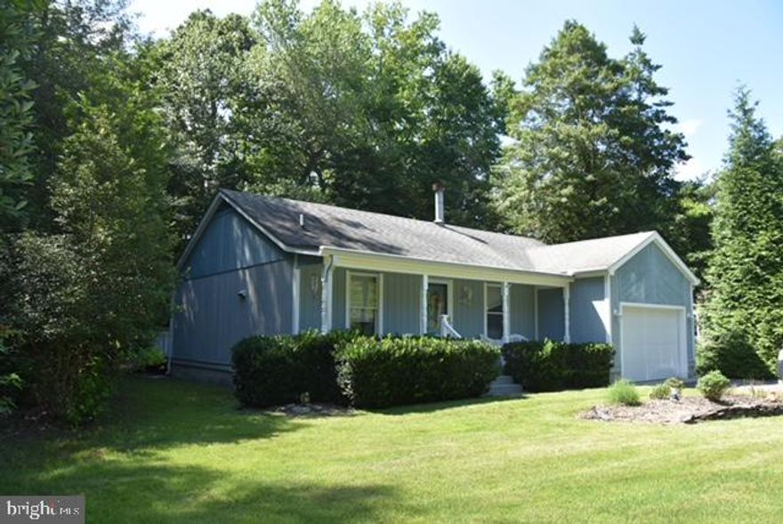Close to the Beaches!

Welcome to this well-maintained 3-bedroom, 2-bathroom ranch-style home situated on a beautiful 0.45-acre wooded lot. Enjoy comfortable living with central heat and air conditioning, a cozy wood-burning fireplace, and an encapsulated crawl space for added efficiency and peace of mind.

This home features a 1-car attached garage, perfect for convenience and extra storage. The wooded surroundings provide privacy and a serene, natural backdrop—ideal for relaxing or entertaining.

Located just a short drive from the Delaware and Maryland beaches, this property offers the best of both worlds: peaceful living with easy access to coastal attractions.

Don’t miss the opportunity to own this inviting home that combines classic charm with modern comfort.