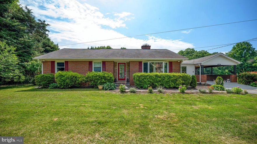 Welcome to your dream home! Situated on a sprawling 2-acre treelined property, this charming 4-bedroom rambler offers a tranquil retreat with the convenience of modern upgrades. As you enter through the gated driveway, you'll be greeted by ample parking and a sense of privacy.  Step inside and be captivated by the recent upgrades and stunning oak hardwood floors that flow throughout the main level. The spacious living room boasts a large bay window, filling the space with natural light, and a cozy brick fireplace, perfect for chilly evenings. Adjacent to the living room, you'll find a custom eat-in kitchen featuring a convenient breakfast bar and upgraded stainless steel appliances, making it a chef's delight.  For added convenience, a mud room separates the house from the carport, providing a practical space to kick off your shoes and hang coats. The entry level of the home also offers three comfortable bedrooms and two full baths, ensuring plenty of room for family and guests.  The basement of this remarkable property is fully finished and offers endless possibilities. A recreation room provides a versatile space for entertainment and relaxation, with a walkout that leads to the beautiful backyard. Additionally, there is an additional bedroom with a second wood-burning fireplace, a full bath, and a utility room equipped with laundry facilities and ample storage space.  What sets this property apart is its potential for a home business or hobby enthusiast. The outbuildings on the premises are ideal for accommodating your professional or personal endeavors. In addition to two sheds for extra storage, there is a separate 700 sqft office/workshop. This dedicated space is equipped with heating, cooling, Cat 6 Ethernet wiring, and cable wiring with a 100 Amp electric circuit. Whether you need a home office, a workshop, or a garage, this versatile structure can fulfill your needs.
Don't miss this incredible opportunity to own a home that seamlessly blends comfort, style, and endless possibilities. Come and experience the peaceful serenity and the practicality of this remarkable property.