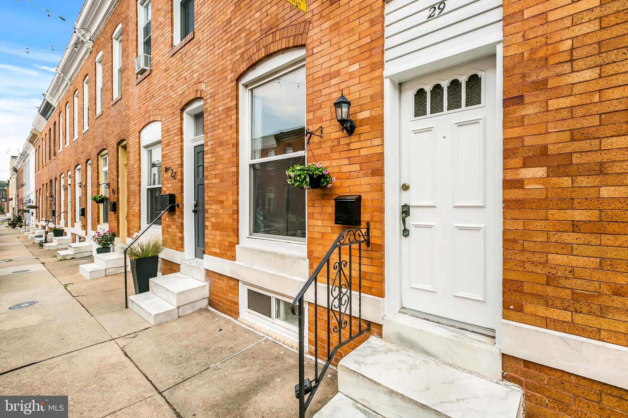 PRIME PATTERSON PARK LOCATION! Located on one of the nicest neighborly, picturesque and form-stone free blocks in the wonderful Patterson Park community! No waterfall granite kitchen islands, no grand dual vanity baths with floor to ceiling subway tile and walk in rain forest showers, no fancy shiplap wall accents to greet you as you walk through the front door. What you WILL GET is a well maintain, home ONLY 1 block West to Patterson Park with all wood floors, an open floor plan, terrific closet storage, with an updated kitchen, terrific natural lighting, updated windows, a huge back yard that could be made into a large raised garden or a pleasant outdoor entertainment area OR a super easy conversion to OFF STREET parking! 3 minute walk to Patterson Public House, to Pie Time, or numerous other emerging fun to check out eateries. Book your showing today and celebrate your settlement across the street in the areas most friendly and iconic neighborhood bar (Roman's Place) for their makeover re-opening happening very SOON!