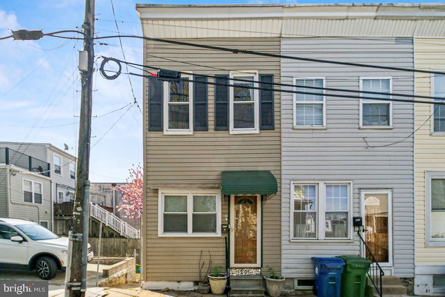 Live at the heart of Hampden in this stylishly updated townhouse just steps from The Avenue! This 2BR, 1.5BA charmer blends character and convenience. The contemporary light-filled kitchen features stainless steel appliances and opens to a private rear deck—perfect for al fresco dinners or morning coffee outside. 
Upstairs, a spacious, primary bedroom with exposed beams brings out the wow factor.  Downstairs, a fully finished basement adds flexible space for a media room, home office, or creative studio. Out back, the enclosed yard with a patio is your own urban oasis—ideal for summer gatherings,  plus a container garden for the freshest herbs and flowers for picking.
But the real magic? Location, location, location. Dellwood Avenue puts you within walking distance of everything that makes Hampden one of Baltimore’s most beloved neighborhoods. Grab brunch, catch live music, or stroll to local shops. Don't miss your chance to plant roots this Spring in one of Baltimore's most vibrant and creative communities.