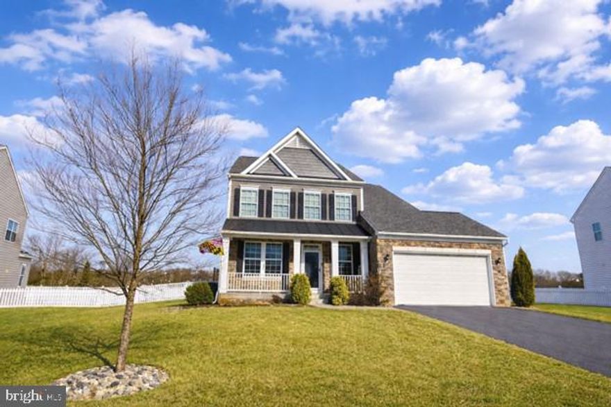 This is THE ONE! Built in 2020 and impeccably maintained, this Westfields beauty offers over 3,600 finished square feet of bright, open living space on a rare premium lot backing to wide open space—an increasingly hard-to-find setting in one of the area’s most popular neighborhoods, just steps from the school. From the moment you walk in, the layout simply works. A flexible front room is perfect for a home office, playroom, or homework zone, then the home opens into a spacious, sun-filled main living area made for gathering. The kitchen steals the show with quartz countertops, tile backsplash, oversized island, walk-in pantry, double ovens, gas cooking, and abundant cabinet and counter space, flowing effortlessly into the family room with cozy fireplace and the gorgeous morning room with doors leading straight to the backyard. Upstairs, you’ll find three generously sized bedrooms, including a relaxing owner’s suite with a walk-in closet and spa-style bath featuring a soaking tub, separate shower, and dual vanities. A large walk-in laundry room upstairs adds everyday convenience right where you need it. The finished lower level offers even more room to live, play, and grow, featuring a huge recreation room perfect for movie nights, game days, or a second hangout space. An additional area is currently being used as a fourth bedroom but can easily adapt to your needs—guest space, home office, workout area, or flex room—along with a full bathroom. There is still plenty of space left to finish if you choose, creating the perfect home theater, gym, craft room, or bonus living area—use your imagination. Step outside and you’ll immediately understand what makes this home so special. The backyard feels like a private retreat, featuring a 16x32 saltwater in-ground pool with heater, LED lighting, and premium filtration. Multiple outdoor living areas include a beautiful cement patio, two expansive decks, a tiki bar perfect for summer gatherings, and an additional deck with gazebo—turning everyday living into a staycation. All of this is set within the popular Westfields community, offering convenient access to I-70, shopping, dining, parks, and an amenity-rich HOA with even more to enjoy. This is a home designed to be lived in, loved, and enjoyed!