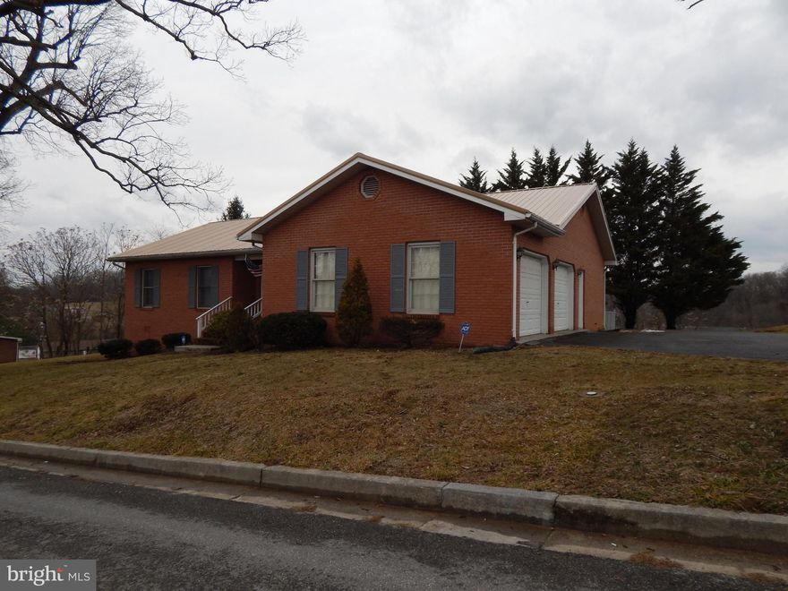 Beautiful, roomy, 3BR, 2BA brick ranch style home situated in the heart of Hedgesville on .46 Acre.   Home offers harwood floors, an open Kitchen, breakfast, family room combo, with separate Dining room and living room area.  Crawl space is tall (5"+ in most areas) for great storage potential.   Sliders in Family Room lead to fenced yard with patio.   2 car attached with a  circular paved driveway.  DO NOT RELY ON GPS
