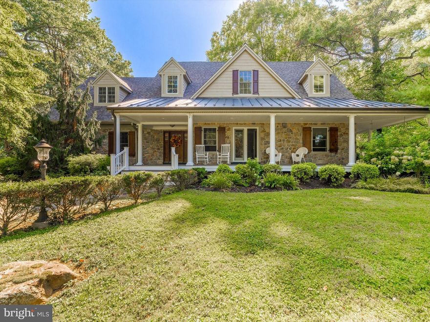 Discover your dream home where elegance meets comfort in this stunning one-of-a-kind custom residence featuring 4 bedrooms and 5.5 baths across 4,279 sq. ft. of thoughtfully designed living space. Set on 2+ acres, this home boasts a wrap-around porch, new roof, and new gutter guards.
Step inside to find sophisticated coffered ceilings and gleaming Antique Heart Pine hardwood floors that add timeless appeal. The formal dining room, anchored by a fireplace, sets the stage for memorable gatherings, while the family room’s own fireplace creates a warm, inviting atmosphere. At the heart of the home, the custom eat-in kitchen with oversized island flows seamlessly into daily life, complemented by cozy radiant flooring. A stylish wet bar elevates entertaining. The spa-like primary suite offers a tranquil retreat with radiant-heated floors and luxurious finishes that transform daily routines into indulgent experiences. Upstairs, fresh paint and new carpet highlight three generously sized bedrooms, each with its own ensuite bath.
The finished basement expands your living options with a home office, laundry room, and flexible recreation space. An oversized detached 4-car 2-story garage provides ample room and potential  (with Township approval) for multi-generational living. Outdoors, enjoy endless opportunities on a private, landscaped lot designed for entertaining or relaxation, as well as the ambiance of sitting on your front porch, enjoying the beauty of Tyler Arboretum with your favorite beverage. Nestled in a sought-after Media location, in Rose Tree Media School District, as well as a short walk to Ridley Creek State Park with walking trails, fishing & many more outdoor activities. The town of Media, the new WAWA Train Station & Shopping are only minutes away! This exceptional property blends custom craftsmanship, flexible living, and a prime setting—truly a rare find.