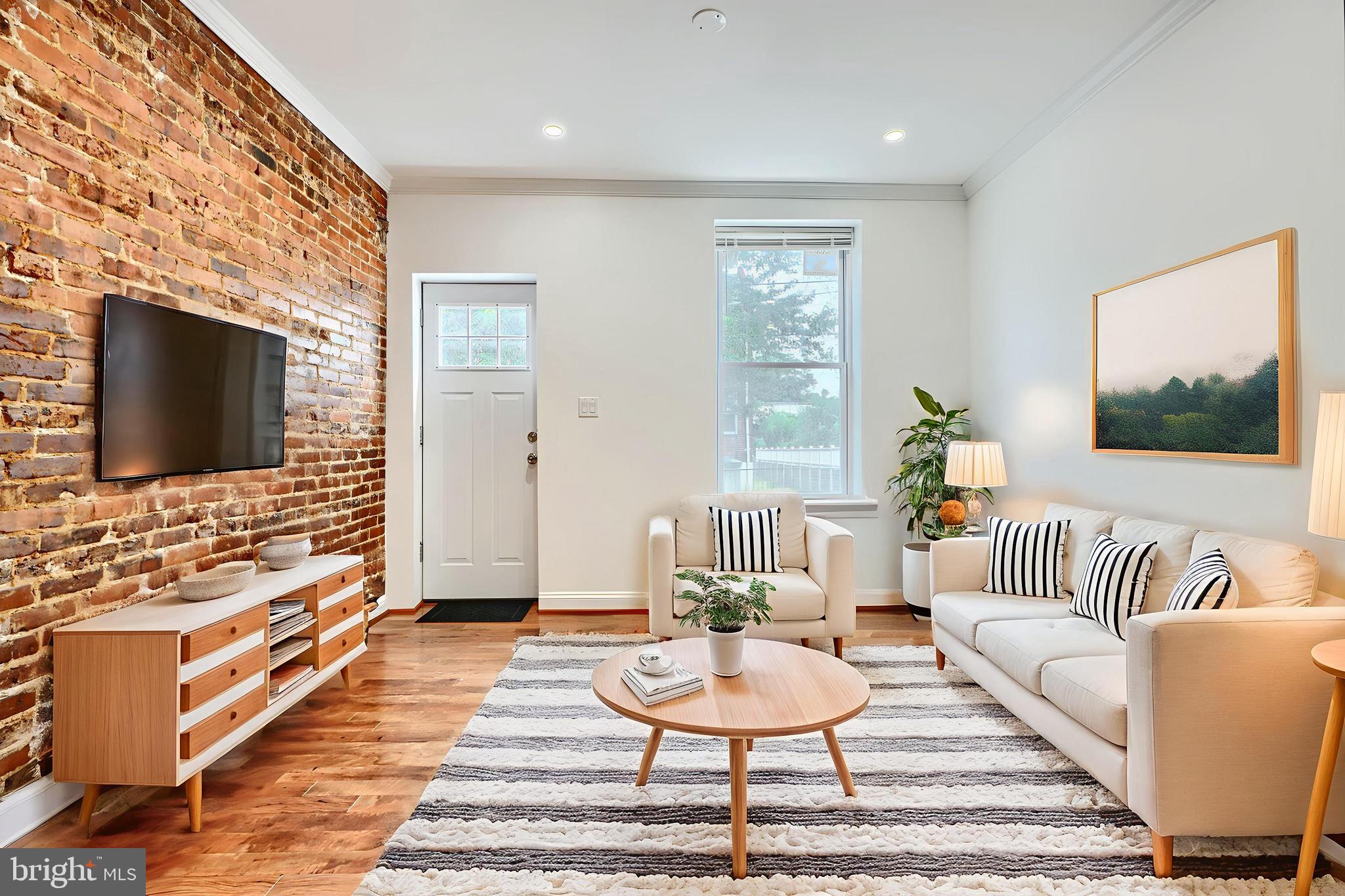 Welcome home! This beautifully updated 2-bedroom, 2-bathroom rowhome is a hidden gem tucked into the heart of Gwynns Falls! Ideally located just 1 mile from St. Agnes Hospital and Hollins Market, with easy access to I-95 via Caton Avenue (1.5 miles). Enjoy nearby green space at Mighty Park and the Gwynns Falls Trail, plus quick trips to Federal Hill (1.5 mi) and the Inner Harbor (2 mi) for dining and entertainment. This home is perfect for commuters, healthcare professionals, or anyone craving that great city life balance.
On the main level, sunlight streams into an airy open-concept layout where the living room, dining area, and modern kitchen flow effortlessly together—ideal for today’s lifestyle and entertaining. Upstairs, you’ll find two peaceful bedrooms complemented by a full bath, each space thoughtfully updated to reflect contemporary comfort and convenience.
The finished lower level adds incredible flexibility, with a second full bathroom, laundry hook‑ups, and easy rear access that opens to a quaint patio—perfect for a morning coffee nook or weekend unwinding.
In Gwynns Falls, 3053 Strickland stands out as a true value. Reach out to schedule your private tour before this opportunity is gone! **Some photos may be virtually staged