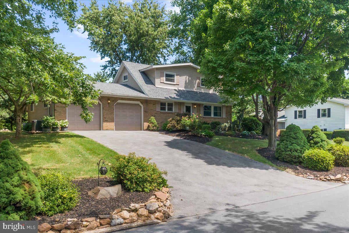 Gorgeous three-bedroom cape lovingly maintained by original owner in Parkland School District. Situated on a beautiful, landscaped lot in Parkland Farms, this home features a first-floor bedroom, modern kitchen, dining room, living room with propane fireplace, and full bath on the first floor. On the upper level there are two additional nice sized bedrooms along with a full bath. The lower level offers a large rec room with wet bar, gas fireplace, and laundry utility room. Upgrades include newer windows, roof, kitchen, central air, and tankless water heater. The large, covered patio and private rear yard offer a wonderful area for you and your family to enjoy the great outdoors. Excellent location, just minutes from major highways, grocery stores, restaurants, and shopping areas. Schedule your appointment today, this home will not last long.