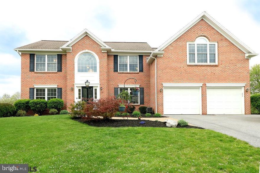 Beautifully updated with generous rooms and space for everyone! Inviting 2 story foyer has central staircase and huge palladium window flanked by a living room with gas fireplace and a sizable dining room with wood floors. Bask in plentiful sunlight in the 2 story great room with wall of windows & electric blinds or gather in the spacious kitchen featuring hardwood floors, SS appliances, island, and pantry. Get to work in the 1st floor office or have fun in the huge walk-out family room. The spacious master suite boasts a WIC with quality built-ins and luxury remodeled bath with heated tile floor, large tiled shower and soaking tub. Three ample bedrooms and stylishly remodeled hall bath with heated tile floor and barn door complete upstairs. Relax on the perched deck under the screened canopy & the lower paver patio with 16 acre green space behind, and play in the sizable yard. New carpet, fresh paint, newer appliances, new wifi thermostats & garage opener, new shed area & morewow!