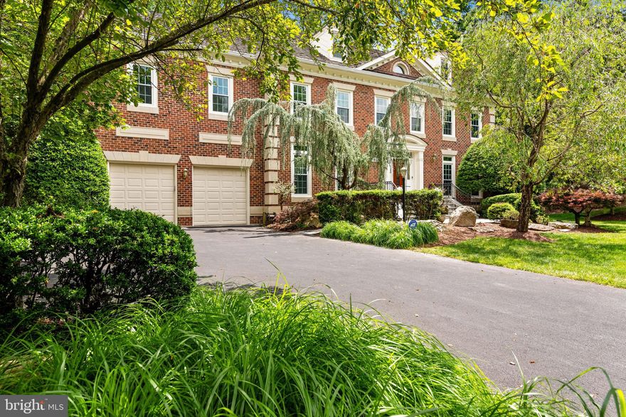 OPEN HOUSE DECEMBER 5th  1-3PM

BRAND NEW PRICE!  Better than new in a picturesque setting! Extraordinary brickwork and custom bluestone walkways welcome you to this fabulous 7,000+ square foot Georgian residence crafted of the finest materials with workmanship that is unsurpassed. Huge deep lot!This home shows as if it was built in 2021 and is in move-in ready condition! The custom landscaping and the almost one acre lot backing to additional common ground are picturesque and afford lush green views from almost every room in the house. A simply fabulous floor plan greets you with all of the right spaces for today's living: The grand entry foyer opens to a private library/office, and a spacious living room with fireplace leads to the dining room with seating for 18. Beautiful hardwood floors, high ceilings, custom millwork, and custom staircases (there are 2!) are finished with an elegant balustrade. Continuing off the main hallway and designed to complete the entire width of the back of the home you will find the sumptuous gourmet cooks kitchen with island and breakfast room, pantry and built in cabinetry which opens to the expansive two story family room with stunning walls of windows, fireplace, built in cabinetry and wet bar. Both the family room and kitchen lead to the outdoor entertaining deck with pergola and staircase ready for outdoor dining in a private landscaped setting. Completing the main level of the home are a full size laundry room with a surprise soaking tub/shower/bath leading to the large two car garage. On the upper level (accessed from both the front staircase and back staircase) you will find 5 spacious bedrooms and 3 full baths. The master suite has more than ample closet space and the flexibility to use one of the 5 bedrooms as an adjacent master sitting room. Hardwood floors in mint condition continue throughout the entire second level. The daylight lower level of the home provides for an additional two full baths, 6th bedroom, plus another bonus room for a home office or den, recreation room with fireplace, pool table room and huge storage room. Hurry, this one is special!