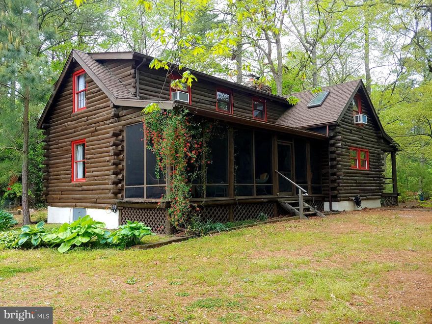 IMAGINE YEAR-ROUND or WEEKEND LIVING IN YOUR OWN PRIVATE LODGE!  TWO completely different vacation environs!  WOODLAND RETREAT with FISHING & CRABBING DOCK/INGROUND POOL and HAVEN JUST 20 MINUTES FROM OCEAN BEACHES!  No other docks in sight, so bask in coveted privacy on 1.13 wooded acres with wildlife neighbors visiting from their undisturbed natural habitats. UNIQUE AIRBNB POSSIBILITIES!  Romantically rustic Cabin-style home with 100’ water frontage on pristine Porters Creek. Organic log walls and vaulted/beamed wood ceilings.  Air conditioned/heated main level with soaring Great Room made cozy by stone hearth wood stove.  Quaint, sun-dappled open Kitchen with updated appliances, Dining Area, and separate Laundry.  Characterful main level Bedroom with 2 double closets and Full Bath.  2 Charming upper Bedrooms with ceiling fan breezes; Full Bath.  2 Screened porch areas gazing over lush native foliage bursting with seasonal colors and serene pond. Creekside concrete inground pool (14’ x 32’) w/automatic vacuum!  2-Car detached garage/storage and furnace shed. Baseboard electric heating on both levels; propane furnace shed for main level; upper level window unit that is both A/C. and heating unit.  BASK IN UNFORGETTABLE CREEK or OCEAN SUNSETS.    ALL OFFERS  WILL BE REVIEWED ON SUNDAY, JULY 16th.