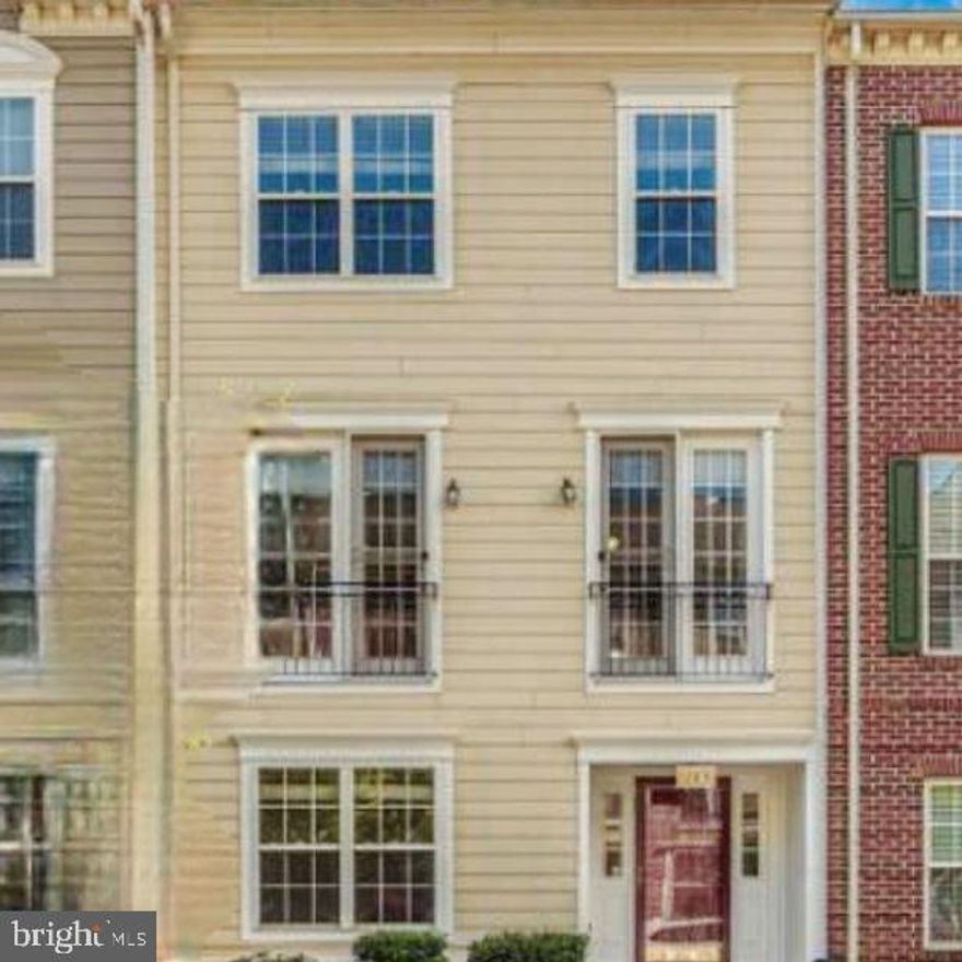 Available for Rent!
This beautifully maintained townhome is located on a quiet street in one of Urbana’s most desirable neighborhoods, just steps away from the community’s exceptional amenities including the pool, tennis courts, tot lots, library, shopping, restaurants, and the district park.

Offering nearly 2,400 square feet of living space, the home features a flexible and spacious layout. The entry level includes a large bedroom—ideal for a home office or guest room—a full bathroom, and a generous recreation area that opens to a private, fenced backyard with a patio. The main level boasts an impressive open living area with soaring 12-foot ceilings, a stunning stacked-stone fireplace, and French doors leading to the deck.
The bright kitchen features an oversized custom island, providing ample counter space and storage for cooking and entertaining. Upstairs are two spacious bedroom suites, each with its own bathroom.