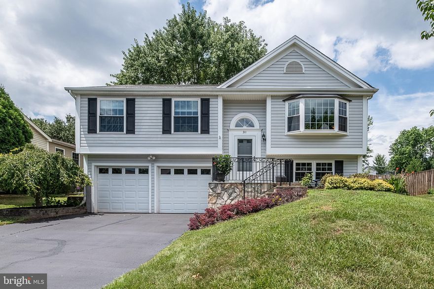 Welcome Home! Immaculate 3 Bedroom, 2 Bathroom home located in Sterling. Amazing location close to loads of shopping, restaurants, NOVA Loudoun Campus and more. Easy access to major roads, great for commuting. Extensive hardscape and landscaping in front and rear yard. Screened in porch and multi-level deck in fully fenced backyard, perfect for entertaining! Updated roof, siding, windows and more! Fully renovated Kitchen with custom cabinets, stainless steel appliances and granite counters. Master Bedroom with fully renovated master bathroom. Open and bright floorplan with hardwood flooring throughout. Large Recreation Room in basement. Attached 2 car garage and paved driveway. A Must See!!