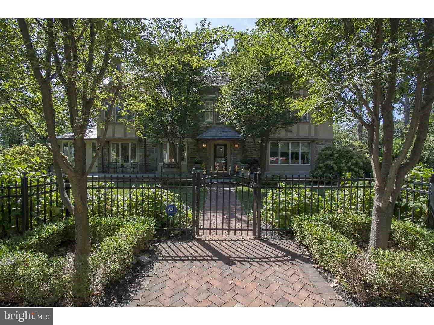 The Jewel of Merion! This home has been impeccably maintained and virtually fully renovated in recent years. It is situated on a quiet street and in a most desirable neighborhood. As you enter, you are greeted with a grand Entrance Hall with gleaming hardwood floors. To one side is the formal Living Room with a Fireplace and it continues into the Music Room which has an entire wall of windows flooding the area in natural light. To the other side of the foyer is a splendid Dining Room, large enough to accommodate holiday dinners or a gathering of friends. The totally redone Eat in Kitchen and Breakfast Room boasts Quartz island and counter tops, plenty of beautiful cabinets, high end stainless steel appliances, a center island and so much more. The adjoining Breakfast Room is perfect for informal dining. The Family Room is a great place to relax at the end of the day and also has plenty of natural light. It opens to the beautifully manicured gardens where the sounds of the trickling fountain, which is surrounded by rose bushes, can be heard. There also is a Mud Room and Powder Room on this level. On the second floor is the Master Bedroom Suite including a full Bath with radiant heated floors, a bedroom converted to a Dressing Room and Walk In Closet. There are 2 Bedrooms sharing a Jack & Jill Bathroom and another Bedroom with a private Bathroom. Rounding out the second floor is a full Laundry Room. The third floor has 2 additional Bedrooms and a full Bathroom. All rooms are spacious with ample closet space. There are also custom built ins along the back hallway. The Lower Level is fully finished with another Powder Room and exterior walkout. Part of the area is set up as a Media Room, another part as an Exercise Room and the rest of it is set up as a Game Room. This is a great area that can be used for many things such as a playroom, a second family room, etc. The meticulously maintained exterior is professionally landscaped with lush plantings and several private gardens and there are patios surrounding the home. The home boasts a lighted sports court and a detached 2 car Garage. The home sits on nearly three quarters of an acre (double lot), is fully fenced in along with exterior lighting around the property. Renovations and improvements abound; hardwood floors throughout, neutral paint, many new windows and the list goes on. Convenient to transportation, schools, shopping and major roads.