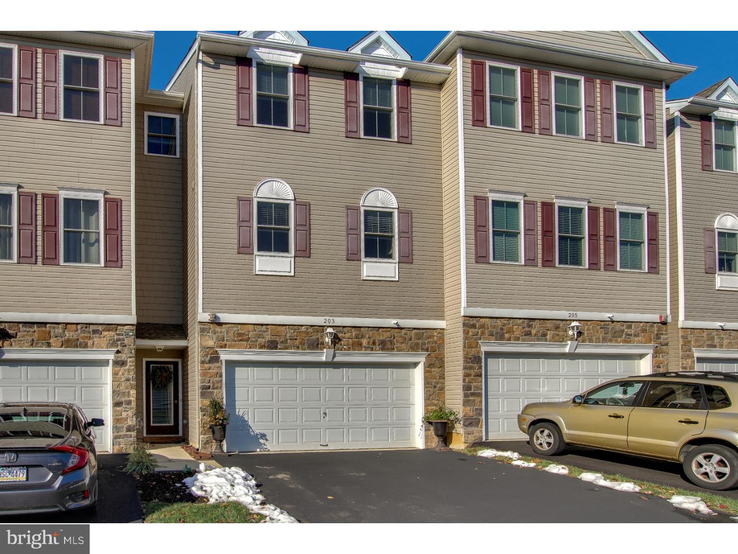 MOVE IN READY 4-year old townhouse located in popular Saddlebrook Estates development! Easy access to major routes, shopping, and entertainment. 9-foot ceilings, hardwood flooring, neutral carpet and paint, and recessed lighting  throughout! Gourmet kitchen package includes upgraded stainless steel appliances, enormous island with sink, french door refrigerator, extra cabinet space, and a mounted microwave. Undermount stainless steel sink with granite countertop and 2 large pantries complete the kitchen. Sliding door off the living room leads to the composite deck with privacy fence and is perfect for grilling and entertaining throughout the year! Upstairs includes three well apportioned bedrooms, ceiling fans, and convenient laundry access. Master bedroom includes large walk-in closet, designer blinds, and master bathroom with stall shower, tiled floor, and vanity. 2nd and 3rd bedrooms both have double door closets with plenty of space. Finished lower level is perfect for use as a family, movie, or game room and has a stone veneer accent wall with an electric fireplace insert perfect for the colder nights. Double car garage with opener leave plenty of room for extra storage. Washer, dryer, refrigerator, and all window treatments are included! Act quickly, or this one will be gone!
