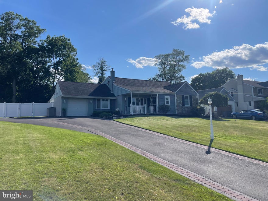 Don’t miss your opportunity to make this impeccably maintained home yours today! Pride of ownership is evident from the moment you arrive. Lovingly cared for by the original “Mrs. Clean,” this exceptional residence showcases a level of maintenance and attention to detail that is rarely found. From the beautifully manicured grounds to the spotless interior, every inch of this home reflects years of meticulous care and thoughtful updates.

Step inside and be welcomed by gleaming hardwood floors that flow throughout much of the home, creating warmth and timeless appeal. The updated kitchen offers an open, airy design with abundant cabinetry, generous workspace, and seamless access to the adjoining dining area. Featuring a dramatic vaulted ceiling, the dining room creates the perfect setting for both everyday meals and holiday gatherings while adding a spacious, elegant feel to the heart of the home.

The inviting living spaces are enhanced by custom wood ceiling detailing and decorative moldings that add character and craftsmanship throughout. The spacious three-season room is sure to become a favorite gathering spot, featuring dual ceiling fans, walls of windows, and ample room for entertaining family and friends. Sliding glass doors connect this bright and welcoming space to an expansive patio, creating a natural flow between indoor and outdoor living.

Outside, you’ll discover a truly park-like backyard retreat. Backing to open space with no homes directly behind, the property offers a peaceful setting rarely found today. The oversized yard provides endless opportunities for recreation, gardening, pets, or simply relaxing while enjoying the privacy and serenity of your surroundings. Two storage sheds offer exceptional space for lawn equipment, hobbies, and seasonal storage.

Additional highlights include a full basement complete with a dedicated workshop area ready for your next handyman project, an attached one-car garage, and an extended driveway with attractive decorative blacktop edging that enhances the home’s curb appeal. Set well back from the roadway, the property offers a grand sense of arrival and a private, estate-like feel.

From the impeccable condition and tasteful updates to the expansive backyard, sun-filled three-season room, and abundant storage, this home truly has it all. Opportunities like this don’t come along often—schedule your private tour today and experience everything this remarkable property has to offer!