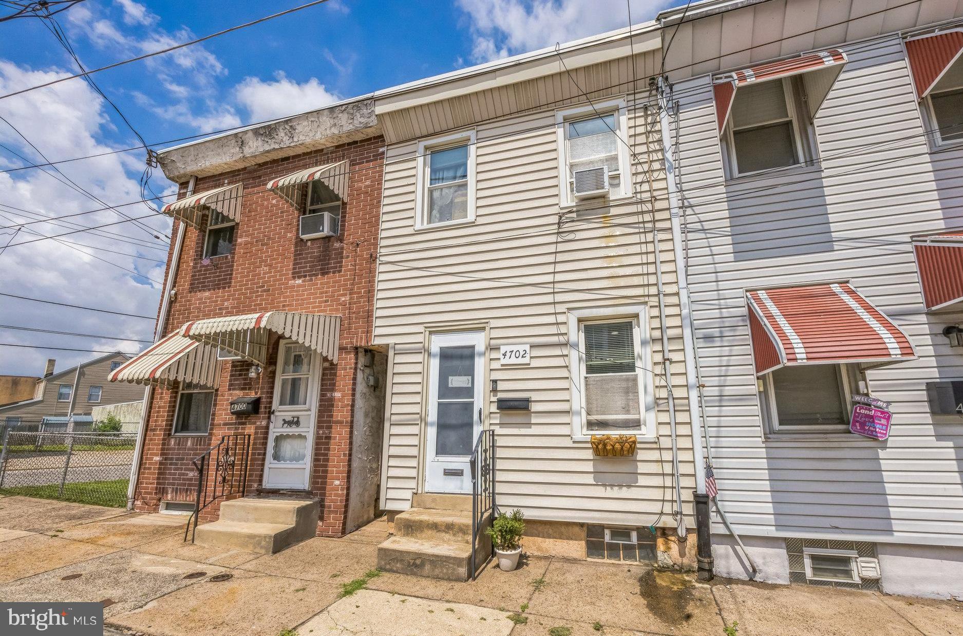 Move-In Ready 2-Bedroom, 1 Full and 2 Half Bath Row Home in the Heart of Bridesburg! Welcome to this beautifully updated home located in the center of the up-and-coming Bridesburg neighborhood. Step into the bright and open first floor featuring stylish, durable wood-grain flooring, recessed lighting, and a spacious living/family room layout perfect for entertaining or relaxing. The large eat-in kitchen is a showstopper with white cabinetry, granite countertops, classic subway tile backsplash, stainless steel appliances, and gas cooking. A convenient first-floor powder room with a large vanity and deep storage closet adds functionality. The rear door leads to a deep backyard with potential for off-street parking—an ideal urban bonus! Upstairs, you’ll find two bedrooms with ceiling fans and a sleek Jack-and-Jill full bathroom featuring modern 12x24 ceramic tile, stand-up shower, wood-grain flooring, and a spacious vanity with medicine cabinet. The basement offers plenty of storage space, a second half bath, and future potential for customization to suit your needs. Freshly painted in modern neutral tones, this home is ready for your personal touch. Located close to schools, parks, shopping, entertainment, public transportation, and major roadways—this is a fantastic opportunity to own in one of Philly’s most promising neighborhoods!