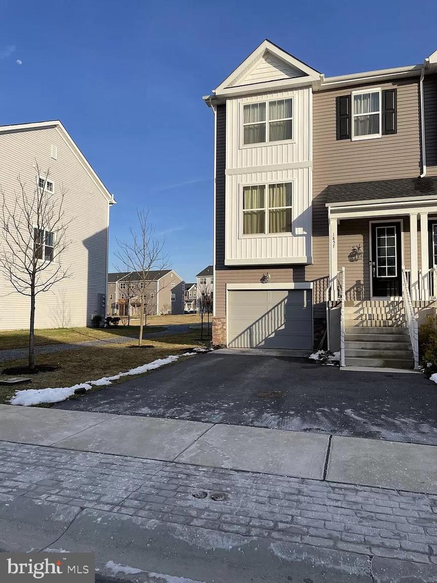 Beautiful end-unit townhome located in the highly desirable Townes at Shannon Hill community. This light-filled home features numerous upgrades and improvements, including engineered hardwood floors, window blinds, ceiling fans, 42” gourmet kitchen cabinets with soft-close drawers, and more.

Enter through the main door into a two-story engineered hardwood foyer with a coat closet and convenient powder room. The main living level welcomes you with 9-foot ceilings and an open-concept layout featuring an expansive family room, dining area, and kitchen. As an end unit, the home offers additional side windows that bring in abundant natural light throughout the main floor. The kitchen includes a breakfast area with sliding doors leading to a beautiful deck, perfect for outdoor entertaining.

The upper level features all bedrooms and a conveniently located laundry area. The spacious primary bedroom boasts a tray ceiling with recessed lighting and a walk-in closet. The primary bathroom is well-appointed with double sinks and a seated walk-in shower.

The lower level offers a versatile great room with engineered hardwood flooring, ideal for recreation or a home office, with walk-out access to the backyard. This level is located behind the large one-car garage.

Conveniently located near shopping centers, corporate offices, and major routes Rt 30 and Rt 322, the home is ideally situated between Downingtown and West Chester. Just minutes from the Thorndale/Paoli Train Station with direct service to Center City Philadelphia. Located in the highly regarded Downingtown Area School District, this home is a fantastic opportunity not to be missed.