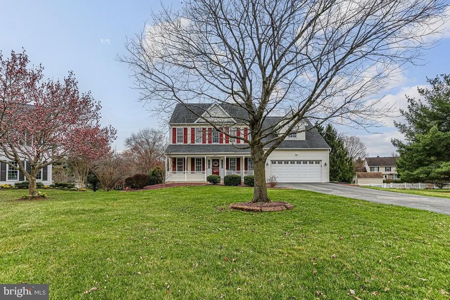 Welcome home to this fully updated four bedroom two and one-half bath colonial in the sought after Harvest Farms subdivision. Featuring 3400 finished square feet on a half acre lot, and situated on a quiet cul-de-sac, this home is move-in ready. The main level features an updated open eat-in kitchen with newer cabinets, luxury vinyl plank flooring, granite counters with a center island, stainless steel appliances, and a bay window. The kitchen opens directly to the spacious family room with a natural gas fireplace, and french doors leading to an 18x14 foot covered screened deck overlooking your private level back yard. The main level is further complemented by separate formal living and dining rooms also with luxury vinyl plank flooring, a half bath, and a laundry/mud room off of the garage entrance. The walkout lower level has a recroom, office area and a bonus room, as well as plenty of room for storage. From the recroom you walk out to the rear yard and patio. Upstairs you will find four roomy and bright bedrooms, including the primary bedroom with a vaulted ceiling, sitting room, his and hers walk-in closets, and a fully updated attached master bathroom with a roman shower, separate soaking tub, and dual sinks. Located in the Carrolltowne Elementary/Liberty High School district, this home is ready and waiting for you!