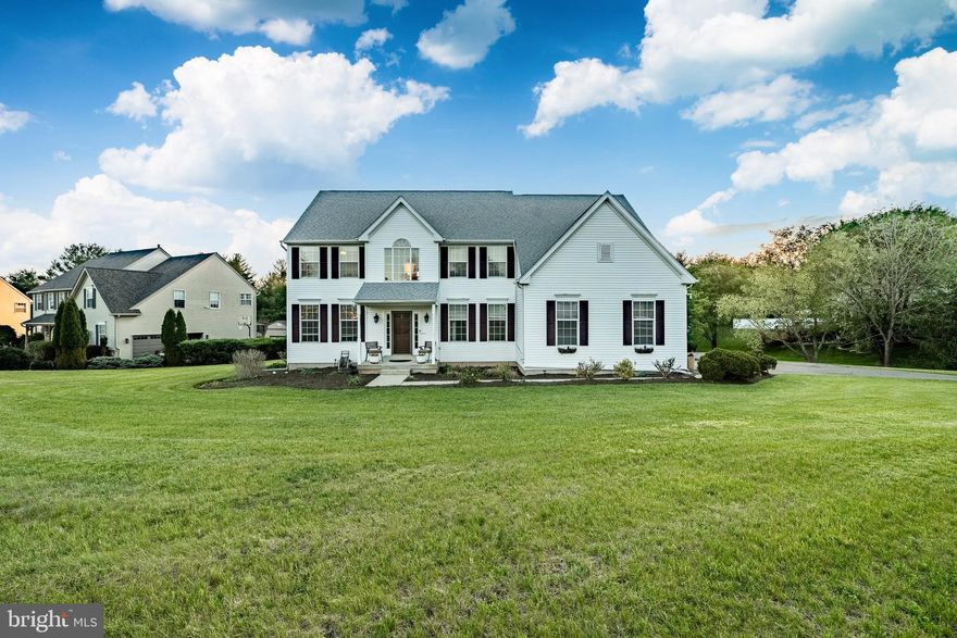 Fabulous corner lot home in sought-after Greenshire Estates! This wonderful colonial has been lovingly maintained by its original owners. With fresh paint and tasteful upgrades throughout, all you have to do is move in. Built by Westrum, this solidly constructed home sits on a flat, half-acre cul-de-sac lot. The exterior boasts a traditional Colonial  facade with an elegant front porch and large windows. Step inside the welcoming two-story foyer featuring new luxury vinyl plank flooring and fresh Sherwin Williams paint that flows throughout the home. To your right, you'll find a cozy study and a convenient powder room. To the left is a bright, generous living room that opens seamlessly into the formal dining room. The heart of the home is the kitchen, and this one does not disappoint. It features crisp white, new solid-wood cabinet doors, abundant countertop space, and Stainless Steel appliances. The kitchen also includes a casual dining area with sliding doors that lead out to a beautiful, hardscaped backyard. Just off the kitchen, a massive two-story family room offers the perfect backdrop for entertaining or movie nights. Upstairs, the expansive primary suite features a luxurious dressing area with ample closet space. The en-suite bathroom is equipped with a double vanity, soaking tub, and a separate glass shower. Three additional nicely-sized bedrooms with excellent storage and a full hall bathroom complete the upper level. As a bonus, there is also a finished  basement. While the property feels like a private retreat, you are just minutes away from local shopping and dining. Enjoy a round of golf at Turtle Creek or head to Spring Mount for skiing. Convenient to 422 and 29, and located in Perkiomen Valley School District. Homes in this neighborhood are rarely available and do not last long!