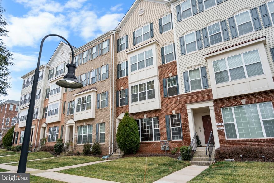 Experience stylish, move-in-ready living in this spacious, light-filled condo/townhome-style residence in a prime Haymarket location—beautifully upgraded throughout. The home features new hardwood flooring across the main level, staircase, and entire upper level, creating a clean, modern look throughout.

The kitchen is the heart of the home, refreshed with new stone countertops, a new center island, and freshly painted cabinetry, plus new stainless steel appliances—including a Samsung dishwasher and Samsung range—and a new LG washer and dryer for everyday convenience. Enjoy the bright, open feel with new recessed lighting in both the kitchen and living room, and stylish zebra blinds in the kitchen and children’s bedrooms.

The kitchen offers island seating—perfect for entertaining—plus an eat-in area with access to a private balcony for morning coffee or evening relaxation. The inviting living area includes a cozy fireplace and flexible space ideal for a home office/den.

Upstairs, the primary suite is generously sized with a walk-in closet and an en-suite bath featuring dual vanities, a soaking tub, a separate shower, and updated stone-topped vanities. Two additional bedrooms and a full bath complete the upper level, also enhanced with updated stone-topped vanities.

Tucked toward the back of the community for added privacy, yet just minutes to shopping, dining, NOVA hospital, and I-66. Water and sewer are included in the condo fee. Move-in ready—don’t miss it!