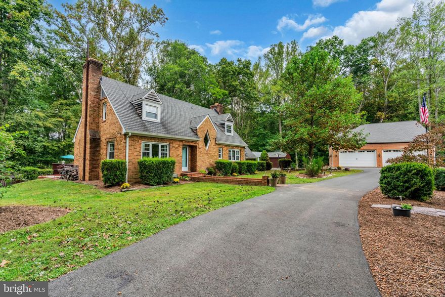 *******Significant ***100k ****Price Improvement ******Welcome to your private paradise nestled on over 5 scenic acres in Clifton! This charming Cape Cod combines timeless appeal with modern upgrades, offering the perfect blend of comfort, style, and convenience—just 30 minutes from our Nation’s Capital and within the sought-after Robinson High School Pyramid.****  Approximately 5000 square feet of living space including the Studio Apartment ***
This 4-bedroom, 3 full bath, and 2 half bath home has been thoughtfully updated throughout. Pull up to the home on a Large Circular driveway & Step inside to find a beautifully renovated kitchen (2008) and a fully remodeled hallway bath (2022) featuring a luxurious walk-in shower. The home has been freshly painted and features NEW HVAC (2024), Energy Star windows (2017), and a CertainTeed Grand Manor roof (2018) with a transferable  lifetime warranty. The hot water heater was also recently replaced, and the septic system has been meticulously maintained with a new pump installed in 2017.
The property is a dream for those who love space and flexibility! A detached 4-car garage, built in 2019, features two levels with an office, a studio apartment that doubles as a 4th bedroom, and a half bath. This space is perfect for a home business, guest suite, or creative retreat. The expansive two-tier deck with a luxury 8-person Jacuzzi overlooks serene parkland, offering a peaceful setting for entertaining or simply unwinding.
With over 5 acres of privacy, modern updates, and easy access to DC, this home truly offers the best of both worlds—a quiet escape with every modern convenience.
Don’t miss your chance to own this rare Clifton gem—schedule your private tour today!

*************OPEN HOUSE DECEMBER 7th 1-4PM*****************