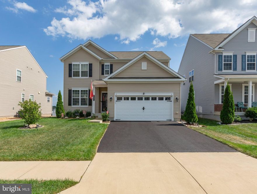 Welcome home to 1631 Hudgins Farm Circle! This GORGEOUS colonial has so much to offer. From crown molding, great gourmet kitchen, granite counter-tops throughout, lovely hardwood floors, gas fireplace to the deck and stamped patio out back in your fenced back yard with extensive hardwoods. As you enter the home you will feel the love that has gone into each detail. Beautiful crown molding throughout most of the home and those gorgeous floors. The foyer and dining area are your first sights. You will love the formal feel in the dining room with the crown molding, chair rail and those shadow boxes give it that final touch.  The family room and kitchen combo are great for entertaining! Open and flowing, with recessed lighting, the kitchen features granite counters, the sink, and dishwasher are in the island so lots of usable counter space and cabinet space, stainless steel appliances and a most wonderful Pantry!! There is room for a small breakfast table or just leave open like the current homeowners. Leading right into the family room with that gorgeous gas fireplace is just the final touch for that warm and cozy feeling. There is a powder room on the main level as well as a mud room as you enter from the garage. On the upper level you will find 4 spacious bedrooms, 1 of which is the primary that features hardwood floors, crown molding and an awesome walk-in closet. The primary bedroom has a private bathroom that features an awesome sports shower with dry off area and dual vanity! 2 of the other bdrms also have walk in closets while the other one has a double door closet. Those 3 bedrooms share a full bath that has a shower tub combo, dual vanities and even a linen closet. There is even a laundry area, so no more carrying laundry up and down steps!! On the lower level you can relax in the large rec room that has high ceilings, crown molding, recessed lighting, full bathroom and sliding glass doors that lead up to the stamped patio, an awesome low maintenance TREX deck and fenced in back yard! There is an additional storage area in the basement as well. We can’t forget about your car; we have a nice 2 car attached garage with indoor access to the home!  Stop in and take a tour, you won't be disappointed in this beautiful well-loved home!!