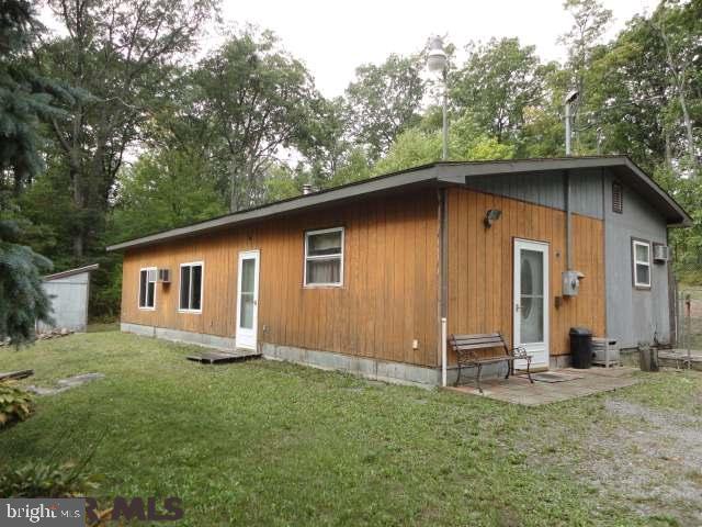 Seven Mountains Get A Way. Conveniently located between State College and Lewistown, this cozy home offers a private setting with easy access to Seven Mountains hiking trails, hunting, mountain biking snowmobiling and much more. Current owner lives year round but would be great for football weekends and seasonal use. Features include; private well, wood pellet stove, spacious kitchen and plenty of space to spread out. Relax outside on the rear deck enjoy the outdoors around a campfire. Use your imagination but don't wait long as these properties sell quickly.