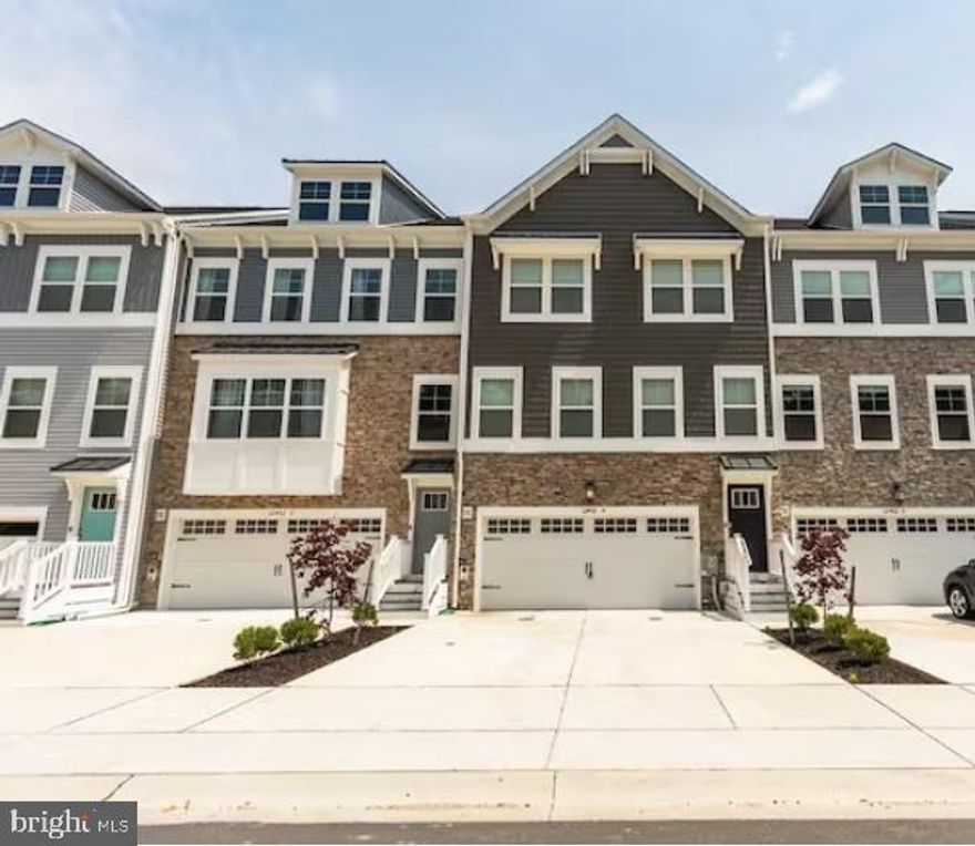 Welcome to Sea Oaks Village located just West of Ocean City! Why wait for new construction when this stunning, high-end  fully furnished townhome can be yours now! The only 5-bedroom currently available in the community, this spacious residence offers a sprawling 3020 sq foot of living space spread out over four levels.  Turn-key and tastefully decorated with top-of-the-line furnishings throughout, this home is ideal for living year-round, vacationing or as an investment.  The main floor boasts an open-concept with plenty of room for everyone to gather including  large living and dining areas and designer kitchen that will undoubtedly be the heart of your home. This culinary haven, where a 15-foot granite countertop/bar steals the spotlight, includes upgraded appliance package, wine bar/butlers pantry,  huge separate pantry.  and a spacious outdoor composite deck to relax or dine al fresco.
A very generous size owner's suite is located on the third floor complete with huge walk-in closet and spacious en-suite.  Two additional bedrooms and separate bathroom as well as laundry conveniently located on this level.  An upgrade to this home is the added 4th level which offers another bed and bath.  Adjacent to it is the rooftop deck perfect for sunbathing or relaxing.  And that's not all.... First floor offers plenty of privacy with an additional owners’ or guests' suite which could also be used as office or rec room and is complete with paver patio, game area and separate entrance. 
This is living the best life! You are less than 2 miles to Ocean City beach and so close to so many great restaurants, championship golf courses, boating & marinas and Assateauge National Seashore.  No city taxes here and one of the lowest HOA’s around! Hurry….before it’s gone!