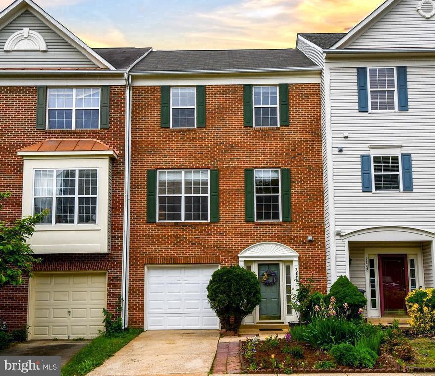 Sophisticated Living in the Dulles Tech Corridor -- Welcome Home -- This gorgeous brick-front, three-bedroom townhome offers three finished levels of freshly painted living space in a prime location tucked away on a quiet street. -- The Entry Level -- Your experience begins in the welcoming foyer, featuring durable tile flooring and a convenient half bath. Double French doors lead you into a spacious family room anchored by a cozy gas fireplace—the perfect spot for relaxation. This level also provides internal access to your one-car garage, a storage closet, and a utility room complete with a front-loading washer and dryer. From the family room, step outside to your private, fenced oasis featuring a patio and grassy area. -- 
The Main Level -- 
Continue upstairs to the main living area, where the open-concept living and dining rooms shine with polished hardwood floors. The space is elevated by elegant crown molding and abundant recessed lighting, creating a bright and sophisticated atmosphere for entertaining. The large eat-in kitchen is a chef's delight, equipped with a gas stove, double sink, and a pantry. For seamless indoor-outdoor living, the kitchen opens directly onto a large deck. A second half bath on this floor adds to the home's functional design.
-- The Upper Level -- 
The top floor features three bedrooms and two full baths, refreshed with brand-new carpeting and modern recessed lighting. The primary suite is a true retreat, featuring a walk-in closet and a luxury bath with a garden tub, large window, and separate shower. The second bedroom also includes its own walk-in closet for ample storage. A well-appointed hall bath with tile flooring and a dedicated linen closet serves the additional bedrooms. -- 
The Location -- 
Perfectly situated for work and play, you are just minutes from and the shopping and dining at The Village Center at Dulles, including Harris Teeter and Frying Pan Regional Park. Commuters will love being within a 10-minute drive of Dulles International Airport and a short distance from the Silver Line Metro, Dulles High-Tech Corridor, and the Park & Ride. This home offers easy access to major routes including Fairfax County Parkway, Rt. 28, and Route 50.