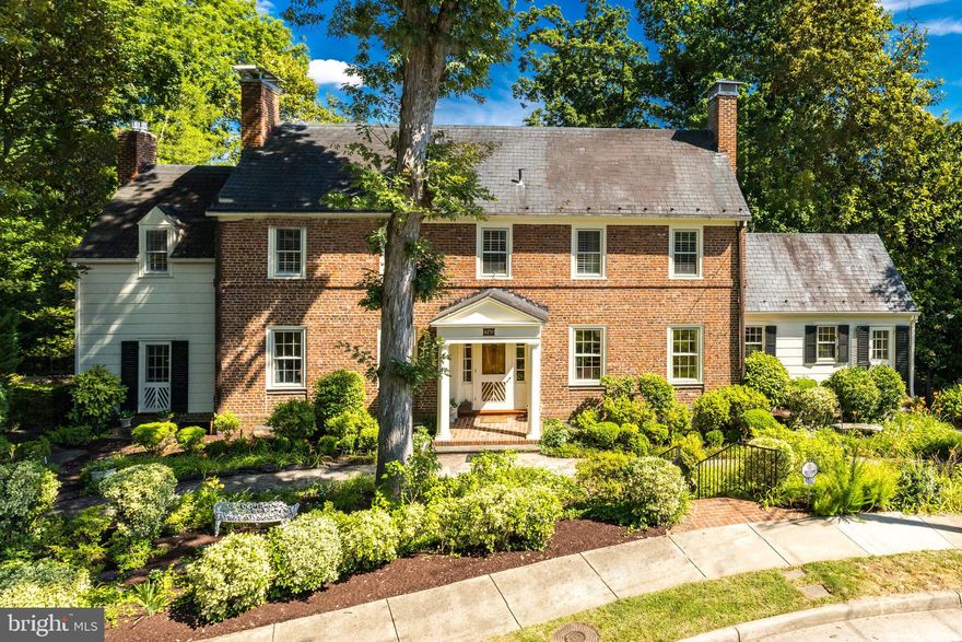 This beautiful and dramatic Belle Haven home offers wonderful entertaining spaces as well as comfortable family everyday living.  Sited amongst towering mature trees, 6237 Radcliff Road, invites you in through a handsome front entrance into a very spacious foyer.  Immediately you realize the abundant natural light in this home.  The formal living and dining rooms are gracious, offering nine-foot ceilings, detailed moldings, pegged hardwood floors and handsome fireplaces in each room.  The paneled family room offers a wall of windows, a gas fireplace and built-in bookshelves.   The updated kitchen with fifteen-foot vaulted ceilings and a dramatic fan window would inspire anyone to become a gourmet cook!  It’s well-appointed with an island and a breakfast bar, soft close cabinetry, high-end appliances, a wine cooler and Perrin & Rowe/Mayfair faucet.  An exciting Gallery with floor to ceiling glass windows overlooks the gorgeous mature trees including a blooming magnolia, has a casual eating area plus a comfortable sitting space for reading or for sharing a glass of wine.  
The graceful curved staircase ascends to the second level where you will find a primary suite with a dressing area, fireplaces, marble bath with oversized shower. A spacious second bedroom with a fireplace and built-in bookshelves offers hardwood floors, crown molding and a glass door opens to the enclosed porch. The third bedroom  has hardwood floors, wood shutters, built-ins, and a large closet.  An updated Jack & Jill bath is convenient for families or guests.  A second story glassed in porch with wood floors overlooks the rear yard.  There is even a peek at the river in the winter time.  
The lower level includes a 4th bedroom, 1.5 baths, office area, an enormous recreation room with built-in bookshelves, a laundry room, additional storage space, and 5th bedroom or exercise room.  There is a perfect blend of sophistication and comfort in this inviting home.  Tax record has incorrect sqft.   Glassed in Galleries - 672 sqft.  Finished lower level - 1,200 sqft not including storage and mechanical rooms.  Total finished sqft. 4,497.   For the first time in twenty years, this is a remarkable opportunity to live in one of Belle Haven’s special residences and become a part of this distinguished neighborhood.