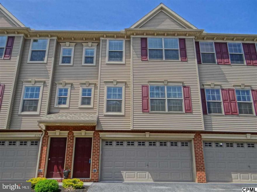 Enjoy Low maintenance living in this ?just like new? 3 Story located conveniently in a quiet community in Hampden Twp!  Property includes tastefully updated paint colors, 2 car garage w/ storage area, lower level w/ finished area & patio access, spacious living room w/ lots of light, eat in kitchen w/ Island Breakfast bar, a Master bdrm w/ WIC & private bath, & even a 3rd floor laundry!  Must see inside to appreciate.