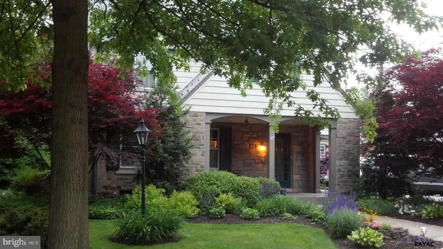 A True Find! This updated 2-story stone home in historic Springdale offers HW & Tile flrs throughout,LR & DR w/built-ins,& FP in LR.Open Flr Plan w/spacious rms make this home full of light. FR/Sunrm w/skylights & wall of wndws overlooks park-like yd w/slate patio & pond. LL finished w/ sep. Rec Rm, Laundry Rm & Wrkshop. A Must See! Minutes to I-83,schools,shops.