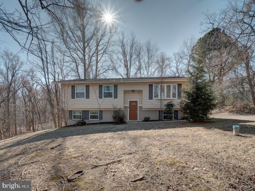 Welcome Home! This beautifully maintained 4-bedroom, 2 bathrooms home is perfectly situated on a private 1.58-acre lot with no HOA! Move-in ready and in fantastic condition, this home offers hardwood floors throughout the main level, an open-concept kitchen, stainless steel appliances, and a spacious living area. Step outside to a lovely deck overlooking the expansive backyard—perfect for relaxation and outdoor gatherings. The lower level is ideal for entertaining, featuring a large open space, a full bathroom, and a versatile 4th bedroom or office. Conveniently located near downtown La Plata, this home offers easy access to shopping, dining, the hospital, courthouse, and major commuter routes, including the Capital Beltway and local military bases. An incredible value—this home won’t last long! Schedule your tour today!