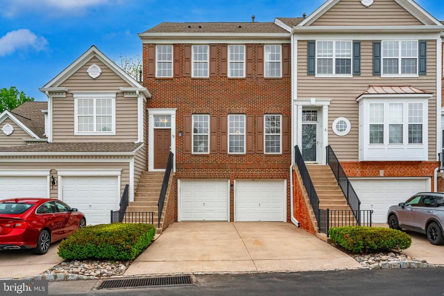 Welcome to 19 Avalon Court — a beautifully maintained luxury townhome in the highly desirable Doylestown Station community, overlooking scenic Central Park in the heart of Doylestown. This spacious 3-bedroom, 2.5-bath Brandon II model offers over 2,400 square feet of thoughtfully designed living space, blending timeless style with modern upgrades.

From the moment you arrive, the upgraded brick façade and inviting curb appeal set the tone. Inside, gleaming hardwood floors, oversized windows, and an open-concept layout create a bright and elegant atmosphere. The formal dining room features a tray ceiling and flows seamlessly into the expansive family room with a cozy gas fireplace — perfect for everyday living and entertaining.

The gourmet kitchen is a standout, featuring granite countertops, custom cabinetry, stainless steel appliances, stone backsplash, ceramic tile flooring, and a spacious prep and dining area. Step outside to the oversized deck and enjoy peaceful park views and relaxing outdoor living.

Upstairs, the luxurious primary suite offers a spa-like bath with dual vanities, soaking tub, separate shower, and a customized walk-in closet. Two additional generously sized bedrooms, bamboo flooring throughout, and a convenient second-floor laundry room complete the upper level.

The fully finished walkout basement provides exceptional bonus living space ideal for a media room, recreation area, home office, or gym, with additional storage and direct access to the attached 2-car garage.

Located just minutes from downtown Doylestown’s shops, restaurants, parks, and award-winning Central Bucks schools, this exceptional home combines comfort, convenience, and low-maintenance living in one of Bucks County’s most sought-after communities.
