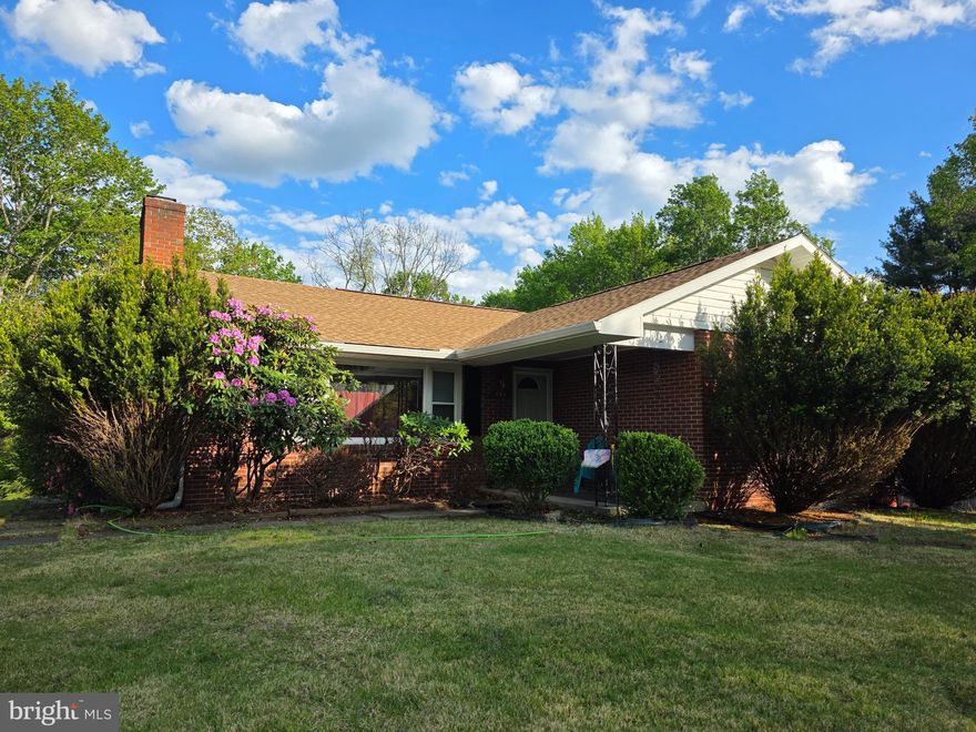 Mountain Views, Space, and LaVale Convenience — This One Checks the Boxes!
Welcome to this spacious brick 5-bedroom, 2.5-bath home perfectly situated in the heart of LaVale, where everyday convenience meets peaceful mountain views. From the moment you step inside, you will feel the charm, warmth, and flexibility this home has to offer.  Featuring beautiful wood floors, updated bathroom finishes, updated flooring, and a comfortable floor plan, this home is designed for both daily living and entertaining. The second kitchen adds incredible value and versatility — perfect for extended family, guests, entertaining, or the possibility of creating an in-law suite. Enjoy year-round comfort with central air, natural gas, electric, and wood heat. For added peace of mind, the seller is including a cord of wood, wood stove (New in the  box) and a generator, making this home as practical as it is inviting. The spacious screened-in rear porch features a hot tub making this the perfect place to relax, unwind, sip your morning coffee, or take in the beautiful mountain backdrop. Outside, you will also find a nice yard and a two-car garage offering plenty of room for vehicles, storage, hobbies, or workshop space.  Another bonus? The furniture and furnishings can convey if the buyer desires, making this an easy move-in-ready opportunity.  Located close to shopping, restaurants, medical facilities, schools, and all LaVale amenities, this home offers the space you need, the views you love, and the convenience you want.  Priced to sell and ready for its next owner — homes with this much space, flexibility, and value in LaVale do not come around often. Call today to schedule your private tour!