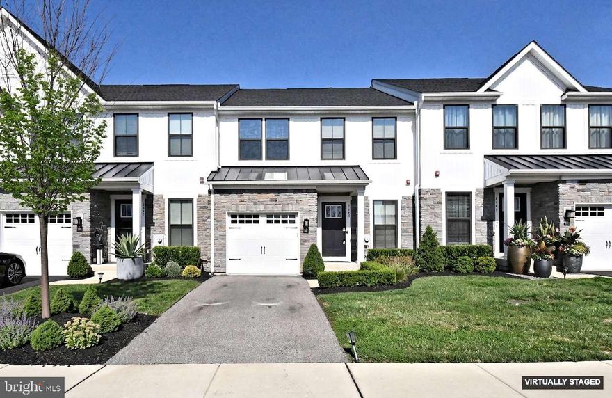 Welcome to 8043 Milltown Circle in Ashbourne Meadows—a stunning, upgraded townhome built in 2022, perfectly situated in one of Cheltenham Township’s most desirable communities. With 2,570 square feet of beautifully finished living space, this 3-bedroom, 3.5-bathroom home blends contemporary style with functional design for today’s modern lifestyle.

Step inside to find a sun-drenched morning room, where oversized windows create a warm and inviting atmosphere—ideal for morning coffee, working from home, or simply unwinding. The open-concept main level seamlessly connects this space to the heart of the home: a chef-inspired kitchen featuring quartz countertops, sleek cabinetry, stainless steel appliances, a gas range, and an oversized island with seating for four. A striking tile backsplash adds a sophisticated touch, while the adjacent dining area and spacious living room make entertaining effortless.

Sliding glass doors lead to a large composite deck overlooking tree-lined views—your own private retreat for dining al fresco or relaxing at sunset.

The fully finished lower level offers exceptional flexibility with an expansive family room, a full bathroom, and a bonus room perfect for an office, gym, or creative space. Thoughtful storage solutions in the mechanical room make seasonal organization simple and efficient.

Upstairs, retreat to a luxurious primary suite with vaulted ceilings, a generous walk-in closet, and a spa-like en suite bathroom complete with a walk-in shower and private water closet. Two additional bedrooms are located down the hall, along with a stylish full bathroom and a convenient upstairs laundry room.

Located in the sought-after Cheltenham School District, Ashbourne Meadows offers the best of suburban living with easy access to city amenities. Enjoy nearby shopping and dining at Greenleaf at Cheltenham and Willow Grove Park Mall, outdoor adventures at Tookany Creek Park and Curtis Arboretum, and leisure at Melrose Country Club. Commuters will love the quick access to Route 611, the PA Turnpike, and multiple regional rail lines—making travel to Center City and Northeast Philadelphia a breeze.

Stylish, spacious, and thoughtfully designed, this Ashbourne Meadows gem isn’t just a home—it’s a lifestyle. Come experience the perfect balance of luxury and livability.