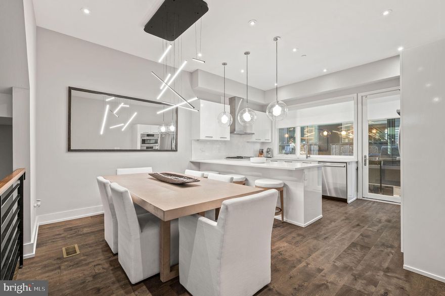 Discover luxury living in the heart of Northern Liberties at Liberty Square, a Gated Community! This stunning fully-furnished 4 Bedrooms, 2 Baths, and 2 Half-Baths Townhome offers modern elegance spread across 3030 sq. ft. Enjoy Garage Parking, a Kitchen Balcony and a private Rooftop Deck boasting panoramic views of the Philadelphia skyline. Step into this sleek home either through the front Entrance or your private Garage. The lower level presents a fully furnished Basement complete with a Gym and private Office area with a Half-Bath. Ascend to the upper level and indulge in culinary delights and elegant dining in this townhome's fully equipped, modern Kitchen and Balcony, seamlessly connected to a spacious Dining Room. Whether you're a gourmet chef or enjoy hosting dinner parties, this harmonious combination, complemented by a generously sized, simply furnished Living Room featuring an Electric Fireplace, creates an ideal setting for culinary exploration and memorable gatherings. Enjoy the fusion of comfort and sophistication, perfect for entertaining or unwinding in style. On the second floor, you'll find two luxurious Bedrooms, each offering comfort and style. A lavish Bath enhances the indulgent atmosphere, while ample storage space ensures convenience and organization, adding to the seamless luxury living experience on this level. The third floor is dedicated entirely to the Owner's Suite, a haven of luxury. Experience bespoke comfort with customized closets designed for your wardrobe needs. Enjoy the opulence of a spa-like Bath featuring a shower and a separate area for added privacy and relaxation, ensuring a serene and personalized retreat. Nestled in vibrant Northern Liberties, savor the convenience of being steps away from top-rated restaurants, shops, and nightlife including Standard Tap, Yards, Cafe La Maude, and more. Explore nearby attractions in Old City, with easy access to public transportation via the Spring Garden EL station for a quick commute to Center City. This exceptional rental opportunity requires the first month's rent and a two-month security deposit upon lease signing. Experience upscale city living in this prime location!