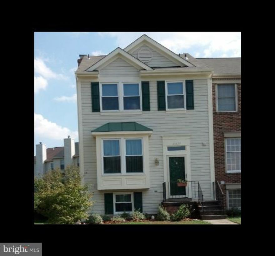 Former model home; sides and backs to common area; has bay window and custom drapes; 2 skylights; 2 master suites with cathedral ceilings; each with full bath & multiple closets; hardwood on entire main level; finished LL rec room with wood burning fireplace, 1/2 bath, storage room and laundry room; walk out to fenced backyard w/brick paver patio; excellent location, close to Route 28 and Route 7