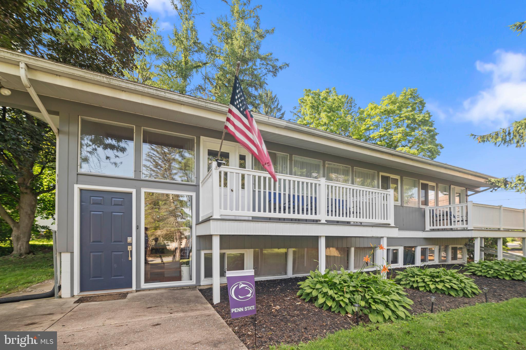 Welcome to this beautifully updated 3-bedroom, 2-bathroom mid-century modern style home tucked away in the heart of State College Borough. Blending timeless design with a subtle Penn State flair, this residence offers a unique opportunity for homeowners, investors, or those seeking flexible living options.
Step inside to discover vaulted ceilings and walls of windows that flood the home with natural light, making the space feel spacious and airy. The interior boasts refinished oak flooring, fresh kitchen cabinets, butcher block countertops, and thoughtful updates throughout—including a brand-new roof—ensuring peace of mind and move-in ready convenience.
Enjoy the warmth and character of not one, but two fireplaces, perfect for cozy evenings. The multiple decks provide ideal spots for morning coffee or entertaining guests in a private, tree-lined setting that feels secluded while remaining just minutes from downtown, campus, parks, and shopping.
Downstairs, you'll find a second kitchen and flexible living space, offering excellent potential for rental income, Airbnb hosting, or multigenerational living. The detached garage not only provides storage but also acts as a buffer, adding privacy from neighboring properties. With minimal lawn care needs maintenance is a breeze.
With a proven rental income, this versatile home is a true Borough gem waiting for its next chapter!