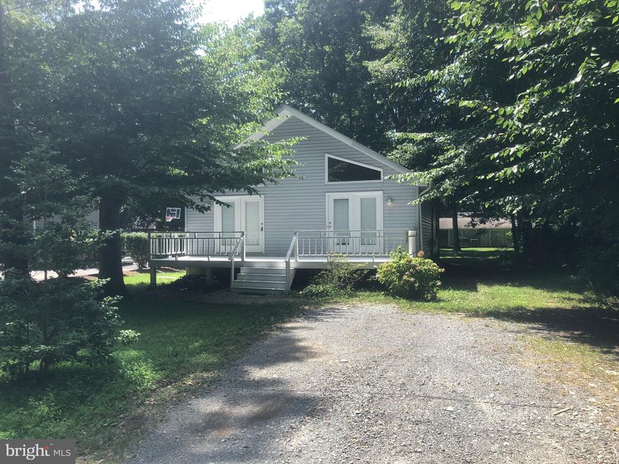 Spacious 3 bedroom, 2 bathroom rambler with cathedral ceiling in living room dining area and kitchen, skylight, and screened in rear porch. Level lot. freshly painted, new floorings.