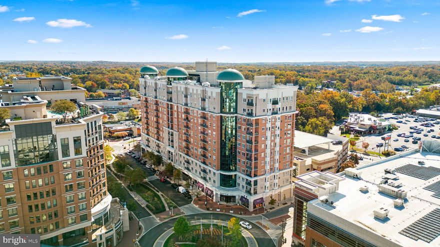This exceptional 5th-floor condo offers a one-of-a-kind, unique floor plan with breathtaking panoramic views and an abundance of natural light from its sunny southern exposure. Featuring two generously sized bedrooms with expansive closets, this upscale residence combines comfort and style. Inside, you’ll find beautiful hardwood floors (no carpet), soaring 10-foot ceilings, elegant granite countertops throughout and NEW appliances. The freshly painted interiors are complemented by custom window treatments that add both privacy and sophistication. Step outside to your private balcony and enjoy sweeping views of the surrounding area.  Two assigned parking space for convenience.  Building Amenities: Rooftop pool with panoramic vistas.  State-of-the-art fitness center.  Elegant club rooms for gatherings and relaxation. Concierge service for a luxurious living experience Ideally located in the vibrant Annapolis Town Center, this condo puts you within walking distance of premier shopping, dining, and entertainment options. Whether you're enjoying a meal at one of the area's finest restaurants or exploring local boutiques, everything you need is just moments away. This is a must-see home that blends modern living with the best of Annapolis! Don't miss out on the chance to call this spectacular property yours.