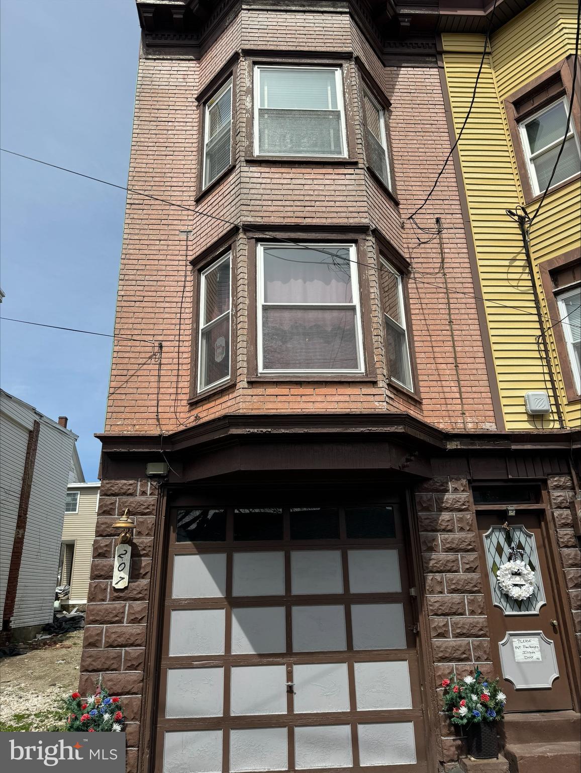 Victorion Twin on quiet St. Basement garage can park two cars. Harwood floors through out, much of the natural woodwork remains. Oil heat. Burner needs to be serviced. Home has been winterized. Close to schools and downtown. 20 Minutes to Hazleton. See pics.