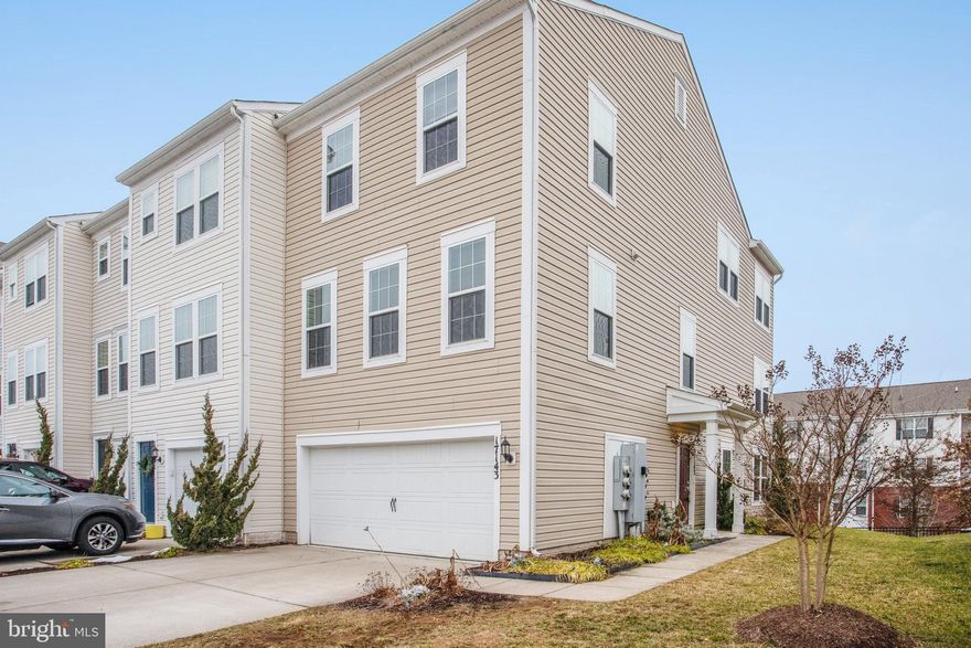 Welcome home! This bright and airy three-level end-unit townhome is waiting for you! On the mail level, you’ll find an expansive living room and dining area with gorgeous hardwood floors and an abundance of natural light. It opens directly into the handsome kitchen, making this an ideal place for entertaining friends and family. The spacious eat-in kitchen features stainless steel appliances, granite countertops, tile backsplash, recessed lighting, pantry, and island bar. Upstairs you’ll discover the primary bedroom, which includes a walk-in closet, plus a massive custom closet system and en suite bathroom with a sophisticated double sink vanity. The two additional bedrooms are both sizable with large closets. In the hall, the full bathroom is bright with a sleek tile tub surround and modern fixtures. Downstairs in the lower level, the bonus room provides you with an additional living space, home office, playroom, or home gym. Step out onto the deck off the kitchen, or patio from the lower level, and enjoy a breath of fresh air. Both spaces will be great for enjoying your morning coffee or relaxing after a long week. A 2 car garage and a wide driveway accommodates 4 vehicles, plus additional surface parking is available for visitors. Minutes to Food Lion, Aldi, Walmart, Southbridge Plaza, Prince William Forest Park, Leesylvania State Park, and Quantico Marine Base. Quick access to Rte 1, Dumfries Road, and I-95. Come check out your new home today!