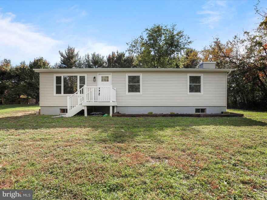 Totally renovated rancher in a supreme location and situated on a lot that provides the feeling of seclusion! Close to Rt. 11, I-81 and just over the Maryland line. Beautifully remodeled  and made new in every way - roof, windows, floors, kitchen, baths, HVAC, electric.... Tastefully done with hardwood flooring, quartz counters, new cabinetry and brand new appliances in the kitchen, tile flooring and granite/quartz sinks in the baths, new tankless water heater, new water softener and new well pump. Basement is partially finished providing great space for a family/rec room, plenty of storage space and large laundry/utility area. All situated on almost 3 acres in a quaint, nestled off the beaten-path neighborhood with river access. Make this your own paradise! Measurements approx. (basement partially finished).