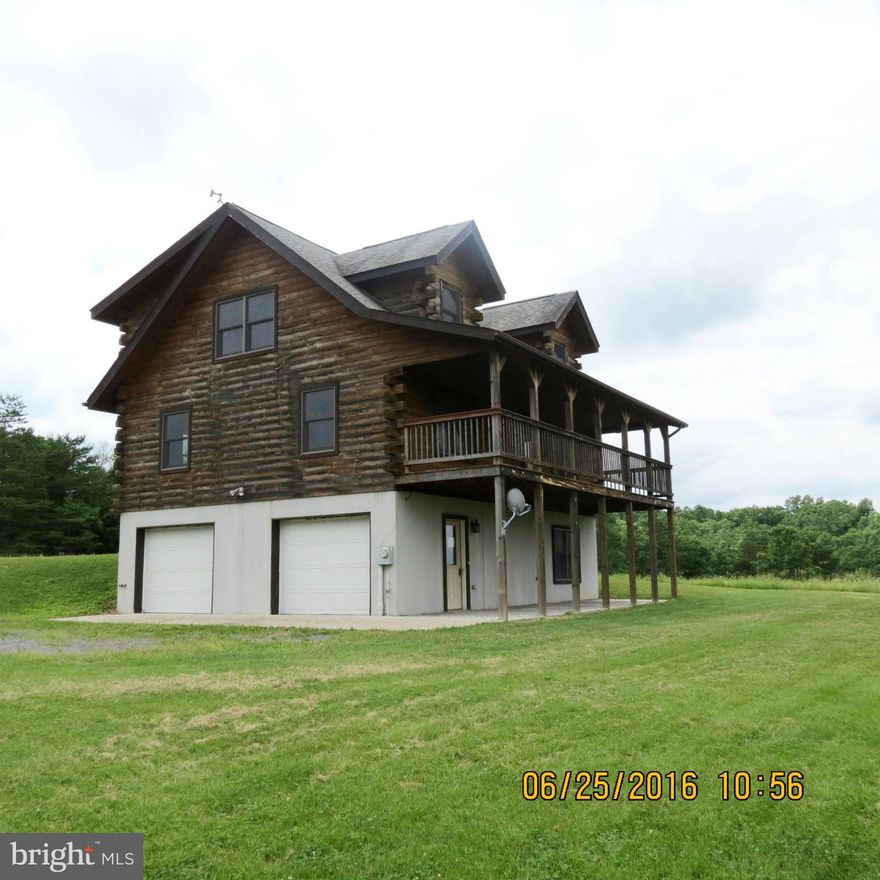 Beautiful log home with mountain views! Enjoy the view while sitting on the deck and watch the deer frolic through the field!  4 Bedrooms, 2 Bathrooms and 2 car garage. This home sits on aprox. 5 acres. Home warranty for owner occupants up to $500. First Look Initiative for owner occupants ends on July 18th, 2016. Roof, plumbing and some carpentry work done.Shows well!. SOLD AS IS. Offer ACCEPTED!