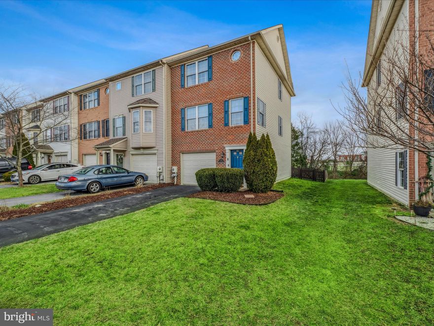 Wonderfully maintained End Unit Brick front townhome located in Hammonds Mill.  3 Bedrooms & 2 1/2 baths.  Fenced rear yard with patio backing to trees is great plus to this home. . All appliances convey.... brand new refrigerator ,washer & Hi-Tech automatic pet door!  Beautiful hard wood floors on middle level and both sets of stairs.  Located close to Spring Mills schools for close access.   Newly painted  for fresh look!  Schedule your tour today!