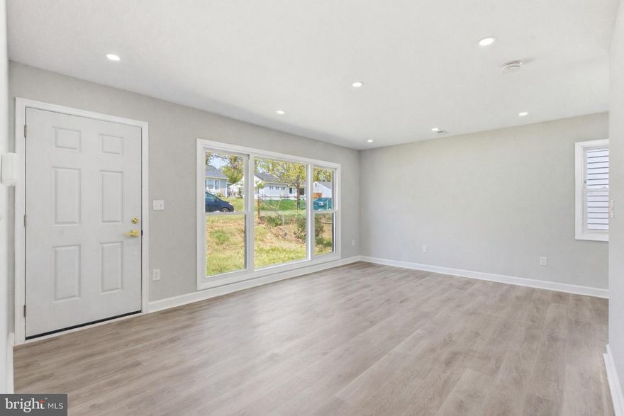 Move-in ready and meticulously renovated from top to bottom, this stunning single-family home offers refined, contemporary living at an exceptional value. The brand-new kitchen showcases stainless steel appliances and modern finishes, while new bathrooms, a new laundry room, new flooring, fresh drywall, and neutral paint throughout create a clean, like-new feel in every room.

The upgrades go far beyond aesthetics — nearly every major system has been replaced, including a new HVAC system and ventilation, new plumbing and fixtures, new 200-amp electrical service with updated wiring, full insulation in the ceilings and exterior walls, and a brand-new roof. New interior and exterior doors complete the transformation. The new owners will feel like the first to call this place home — with the peace of mind that it's built to last for years to come.

Ideally situated near Route 50, the BW Parkway, and I-495, with easy access to public transportation, this home is a commuter's dream with quick connections to DC, Annapolis, and beyond. Enjoy nearby parks, trails, shopping, and the energy of the vibrant Hyattsville Arts District — all just minutes away.

A completely renovated single-family home in a convenient, family-friendly location — this is a rare find. Don't miss your chance at this turnkey gem!